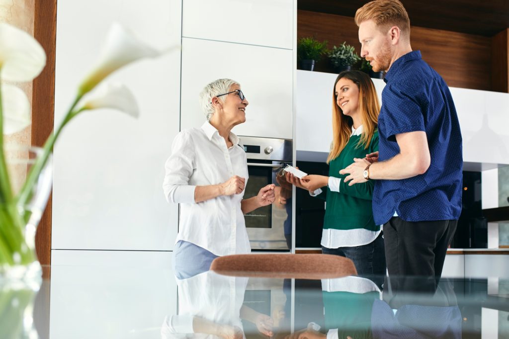 Couple shopping for a new kitchen in showroom